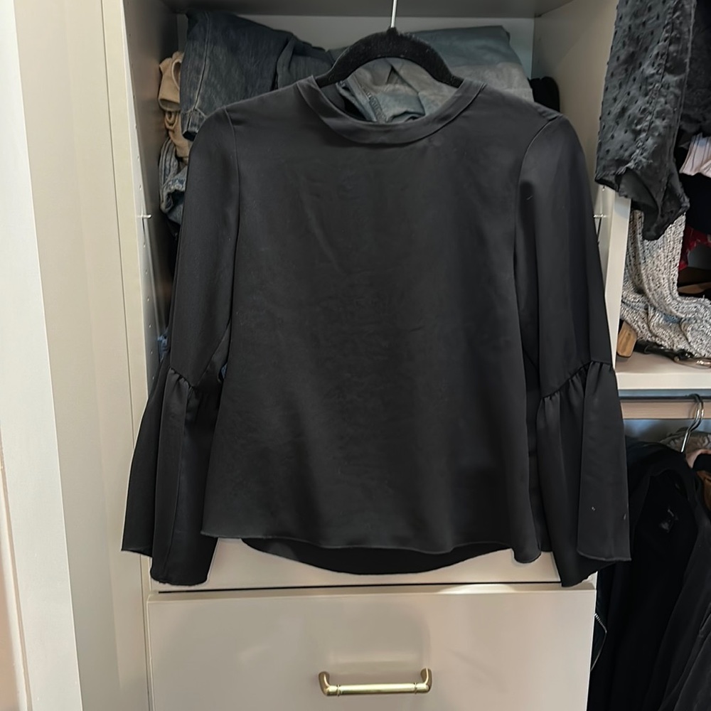 Black long sleeve blouse with winged sleeves